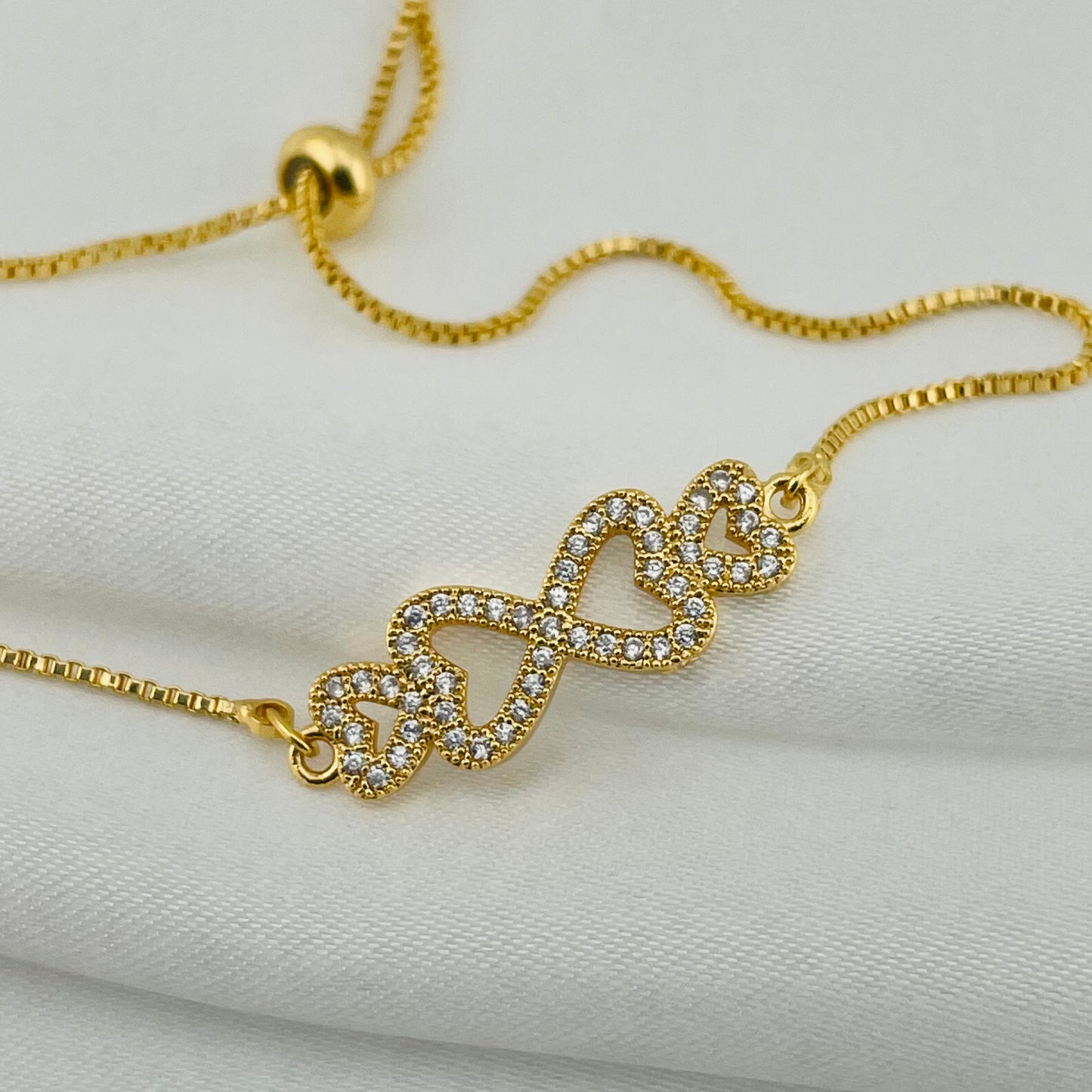 Infinity Heart Bracelet – Stone-Outlined Hearts | Adjustable Imitation Gold Bracelet