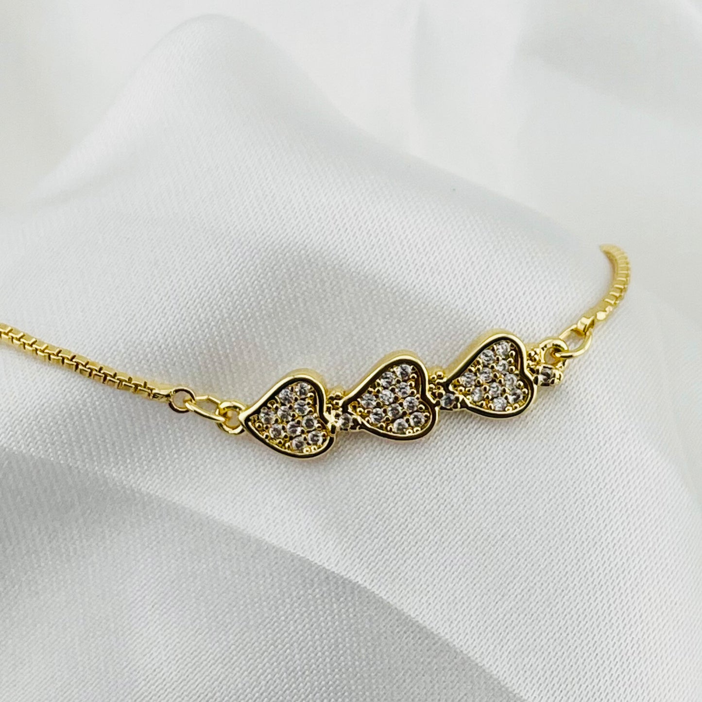 Triple Heart Charm Bracelet – Stone-Filled Hearts | Adjustable | Imitation Gold Fashion Jewelry
