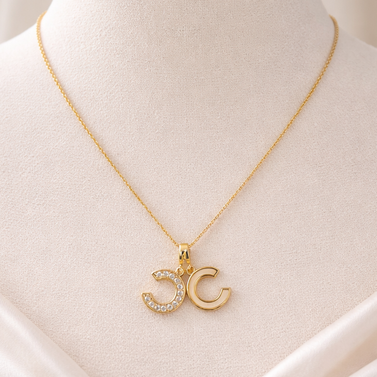 NECKLACE WITH CHANEL PENDANT PEARL AND STONE FILLED, ADJUSTABLE CHAIN, FASHION JEWELRY IMITATION GOLD