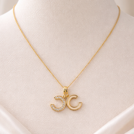 NECKLACE WITH CHANEL PENDANT PEARL AND STONE FILLED, ADJUSTABLE CHAIN, FASHION JEWELRY IMITATION GOLD