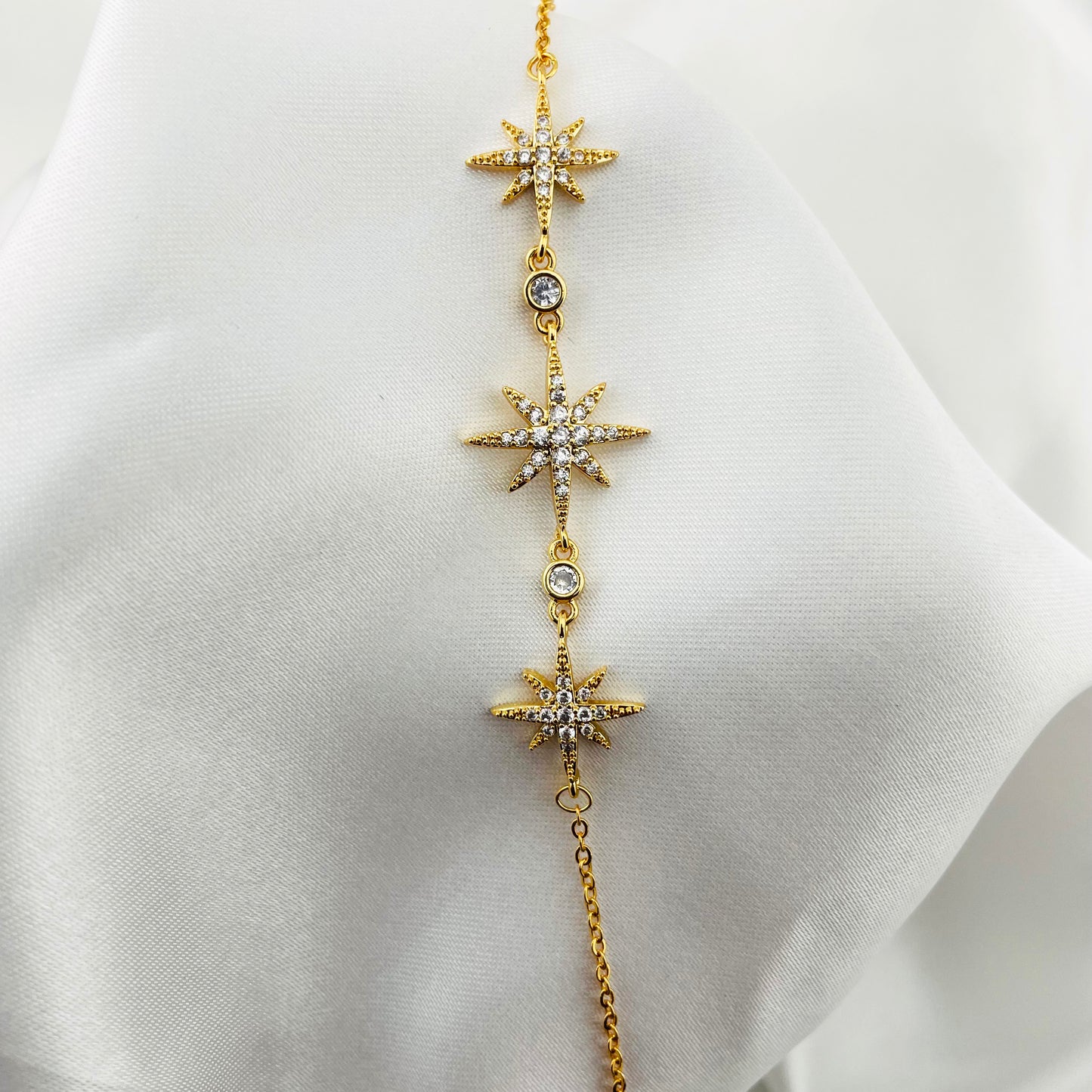 Starburst Charm Bracelet – Crystal North Star Motifs | Imitation Gold Adjustable Bracelet