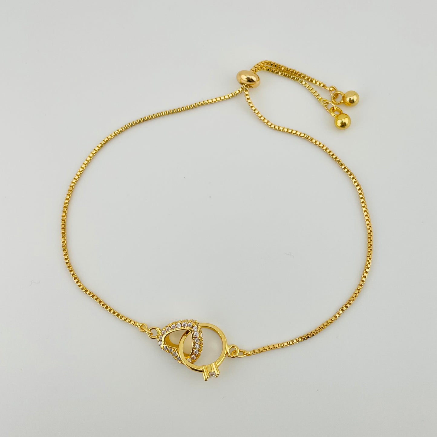 Heart Charm Bracelet – Stone-Outlined Ring Interlocking Hearts | Imitation Gold Adjustable Bracelet